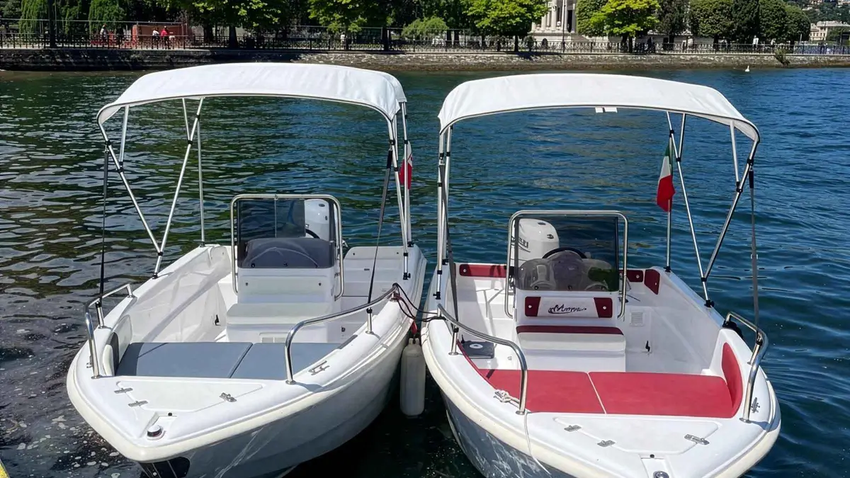 A 40 HP self-drive speedboat crossing open water on a no-license boat rental in Como, Italy